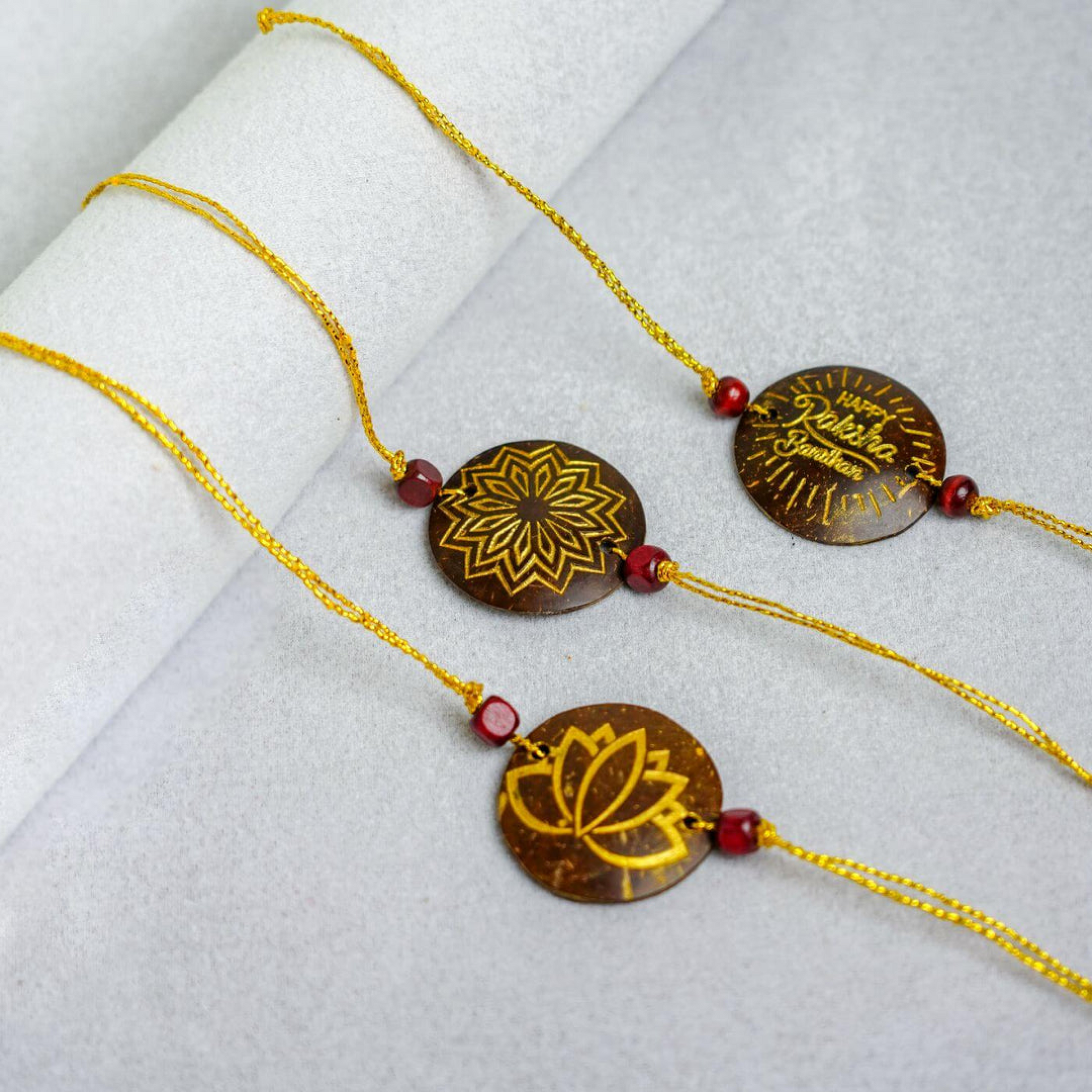 Coconut Shell Sustainable Rakhi's (Package includes Rakhis, Jute Potli & Raksha Bandhan Card) Set of 3